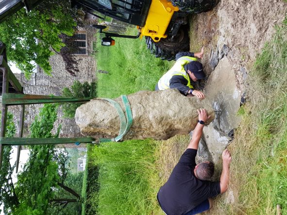 Lowering Monument to Ethelburga in place